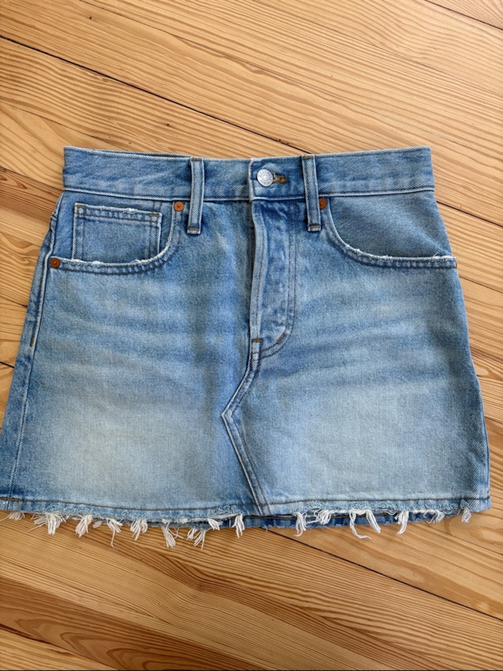 Light Blue Denim Mini Skirt with Frayed Hem